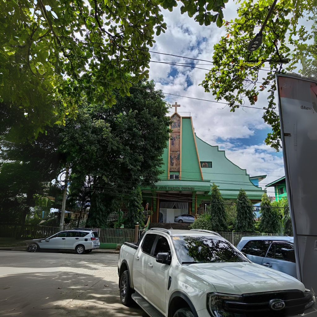 Facade of San Jose Parish Church with towering spires